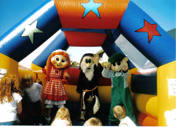 Polly, Merlin and Ned on the Bouncy Castle